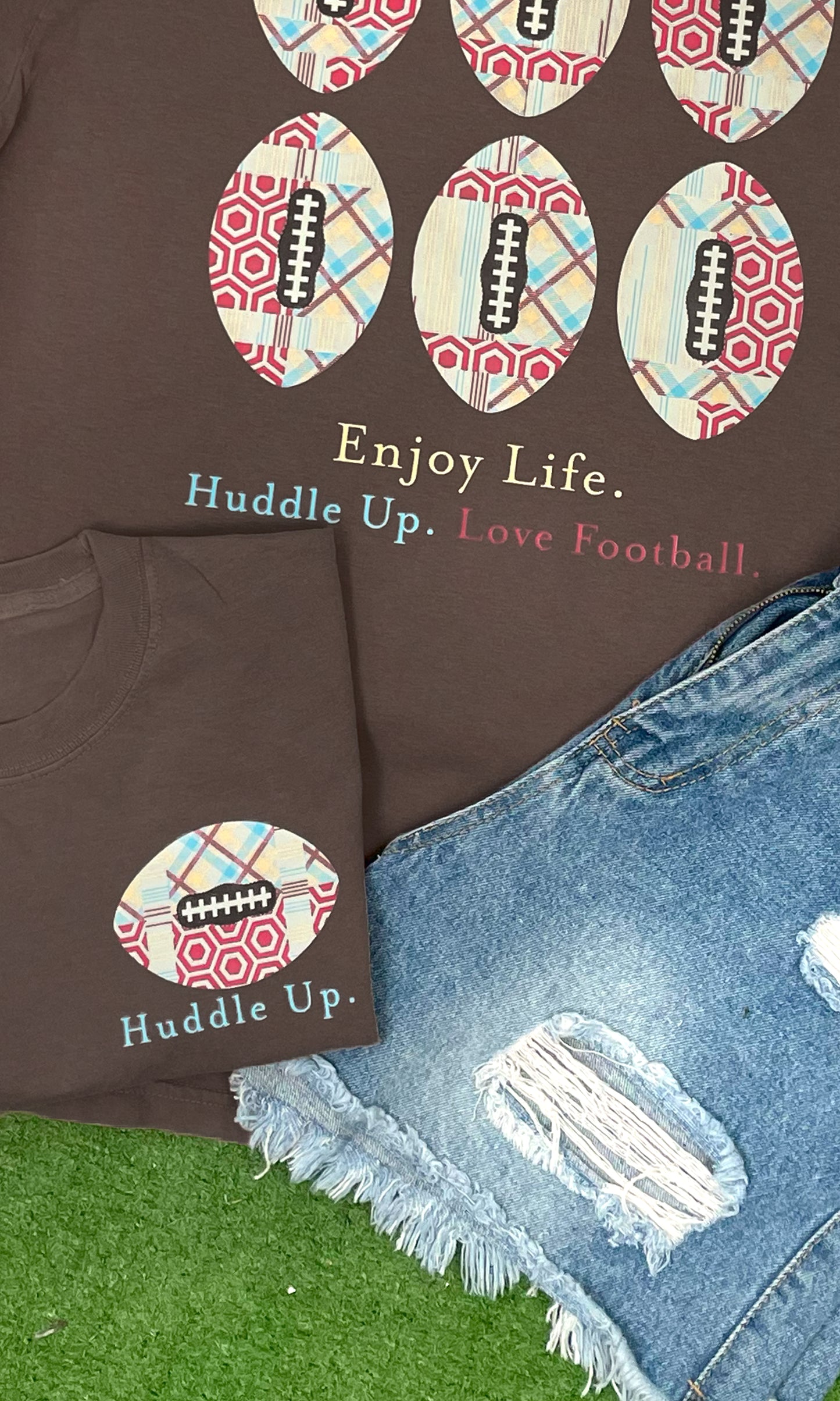 Stylish Huddle Up Love Football Graphic Shirt featuring playful football designs, perfect for game day or casual wear.