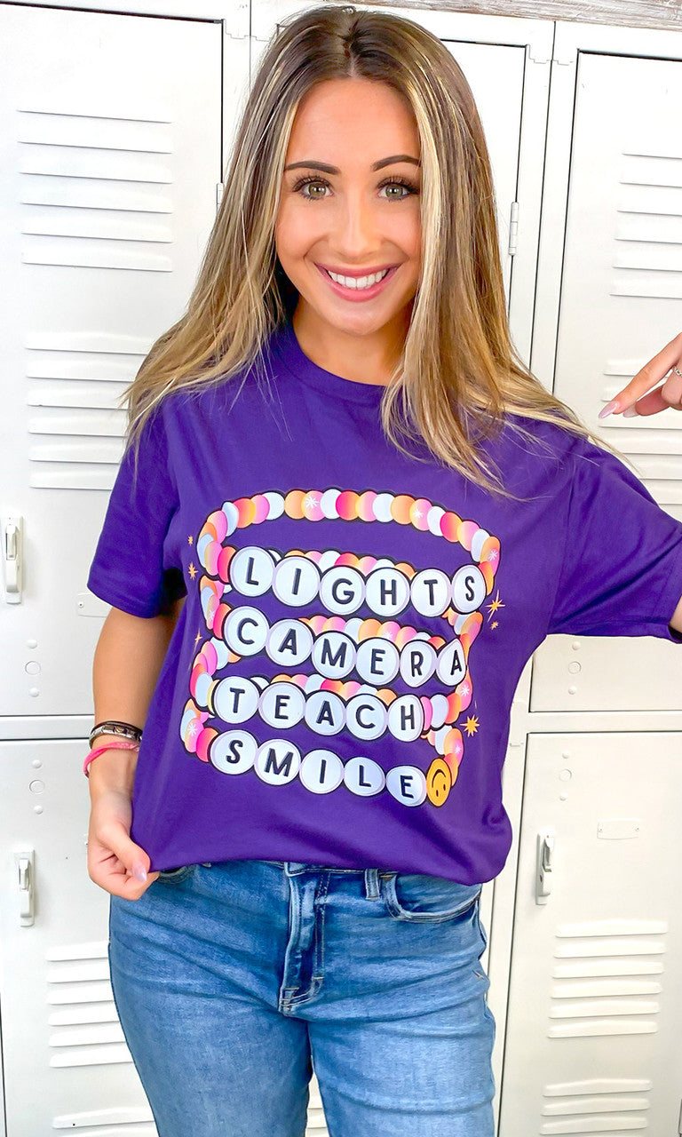 Lights Camera Teach Smile Purple Graphic T-Shirt