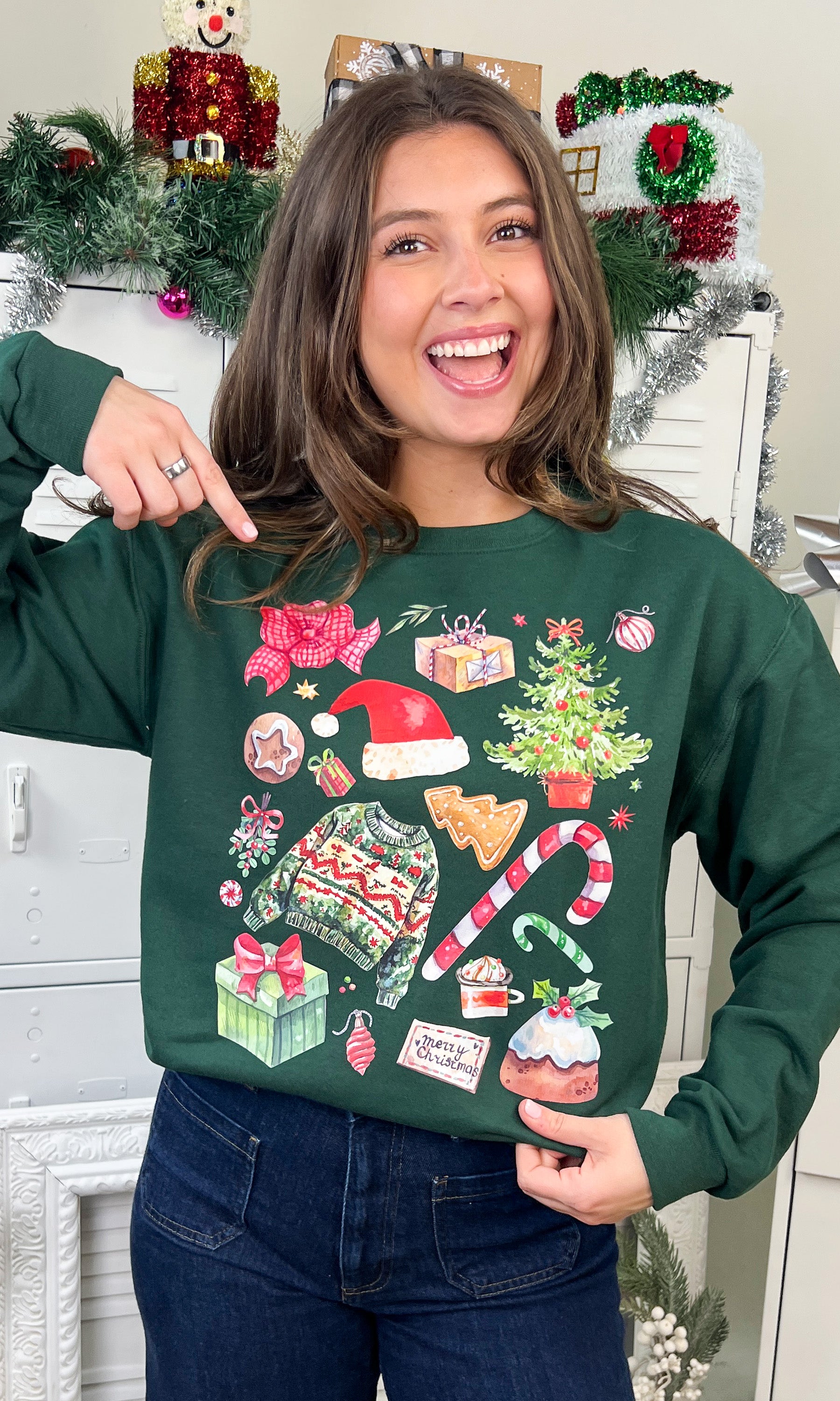 Festive and fun, the Christmas Collage Graphic Sweatshirt features a cheerful holiday design perfect for seasonal celebrations.