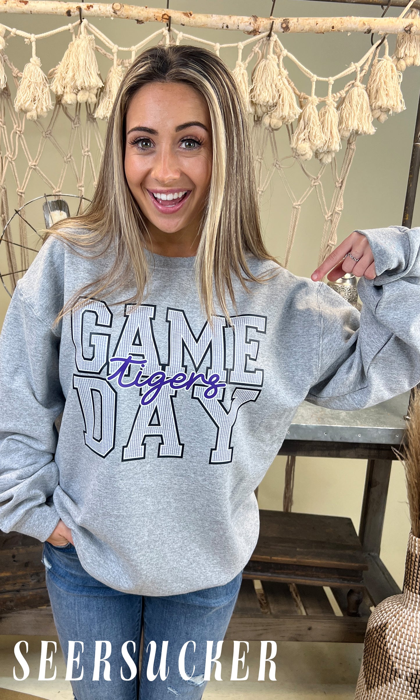 Celebrate game day in style with the Game Day Custom Pattern Graphic Sweatshirt from Seersucker. Perfect for fans!