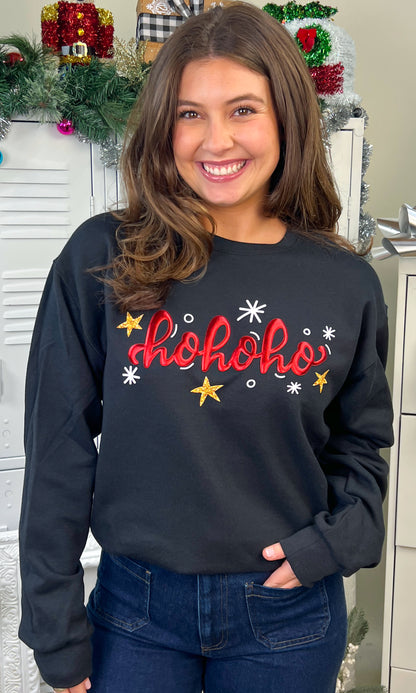 Model showcases the HoHoHo Metallic Puff Christmas Graphic Sweatshirt with festive design, perfect for holiday cheer.
