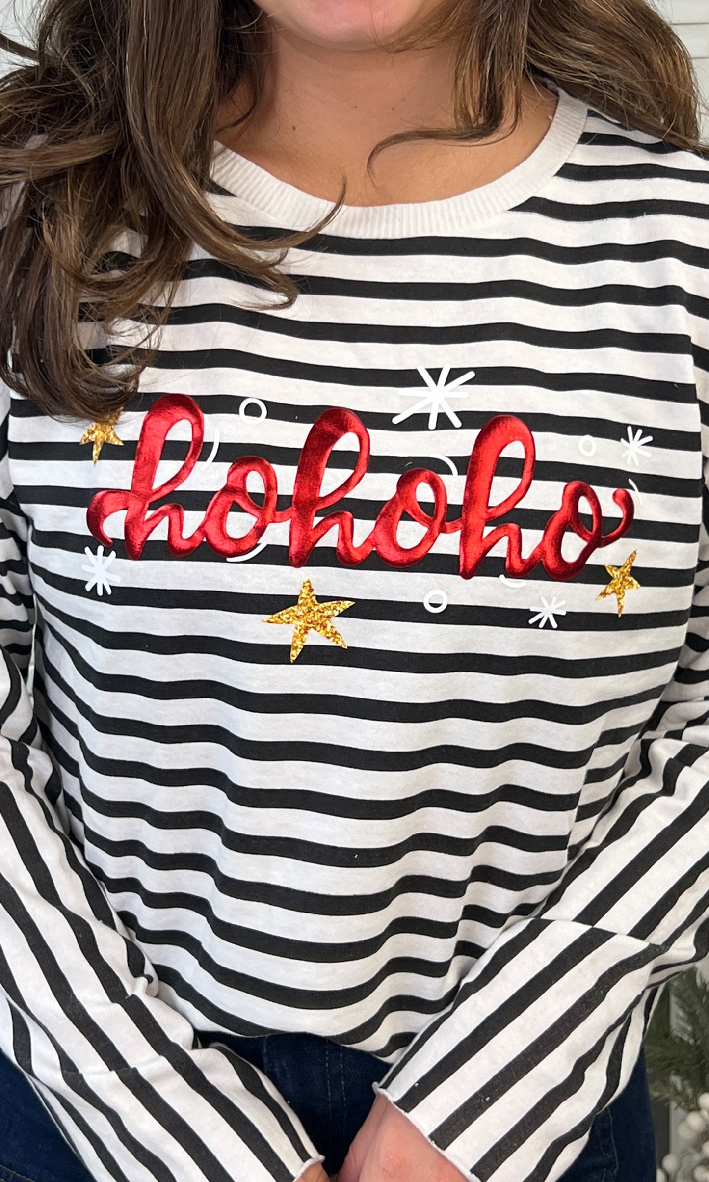 Stylish HoHoHo Christmas Metallic Puff Edgy LS Striped Graphic Shirt featuring festive red lettering and stars.