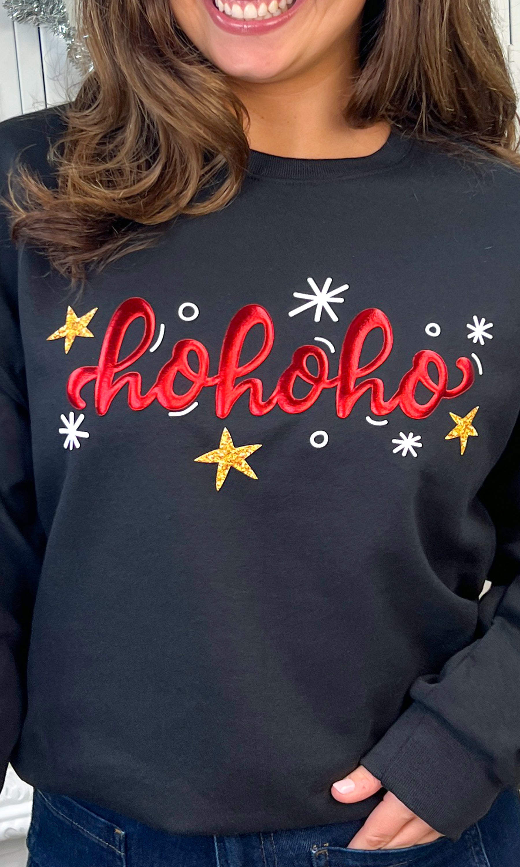 HoHoHo Metallic Puff Christmas Graphic Sweatshirt featuring festive design and vibrant colors, perfect for the holiday season.