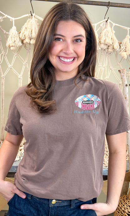 Showcase your passion for the game in the Huddle Up Love Football Comfort Color Graphic T-Shirt, perfect for fans.