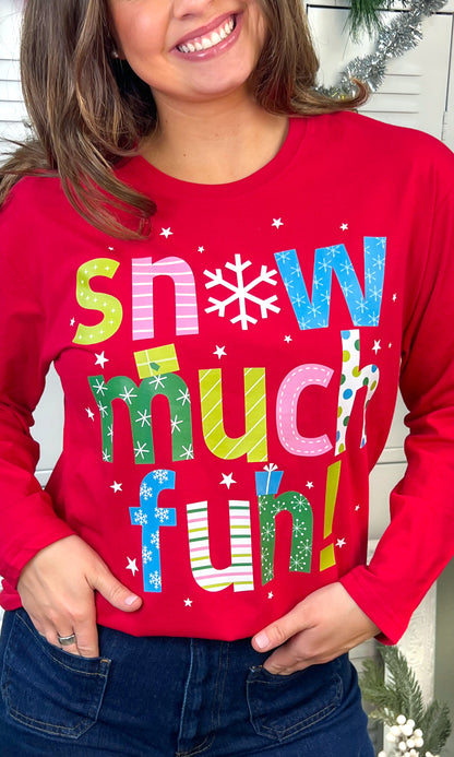Bright red Snow Much Fun Christmas Graphic Long Sleeve T-Shirt features playful text and festive designs for holiday cheer.